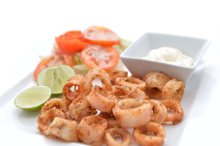Deep Fried Calamari Rings with Sauce Bowlの写真素材