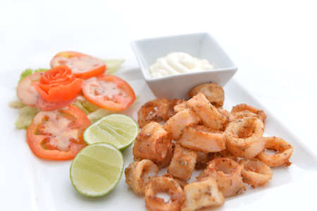 Deep Fried Calamari Rings with Sauce Bowlの写真素材