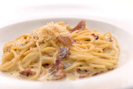 Spaghetti Carbonara with bacon and cheeseの写真素材