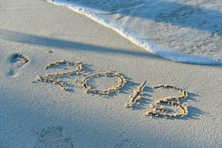 inscription 2014 on sea sand beachの写真素材