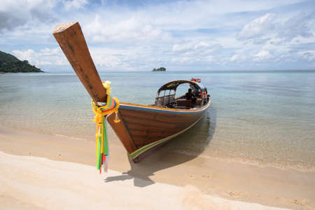 Traditional longtail boats in bay of Lipe island, Thailandの写真素材