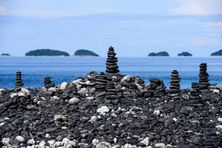 stach of stone on pebble beachの写真素材