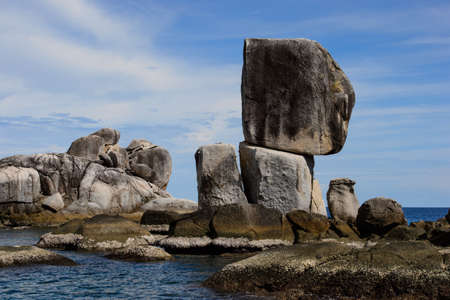 amazing tropical sea with human shape granite rocksの写真素材