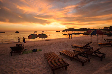 Sunbeds on the beach at sunset, Thailandのeditorial素材