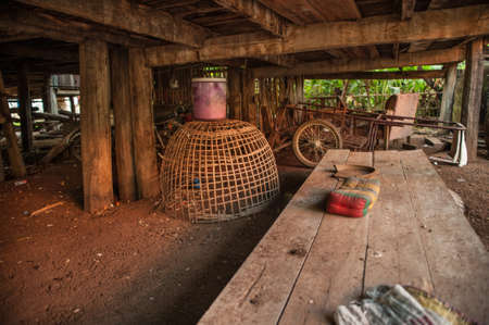 Old wooden cart in an abandoned mill.の写真素材