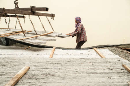Concrete block for a new building on a construction site in rural countryside.の写真素材