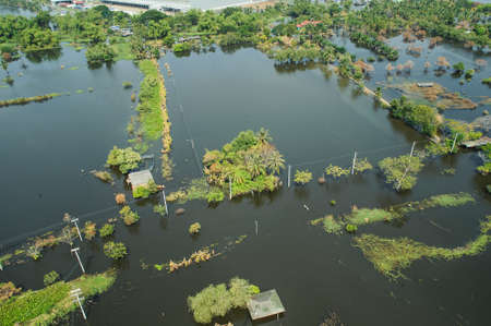Flood waters overtake a city in Thailand form above view