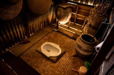 Old toilet in the Thai countryside home.の写真素材