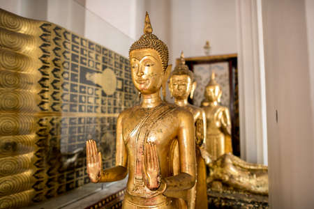 The Buddha statue decorated the temple hall in Wat Ratcha Orasaram Ratchaworawihan or Wat Ratcha Orot, Khwaeng Bang Khun Thian, Khet Chom Thong, Bangkok, Thailandのeditorial素材