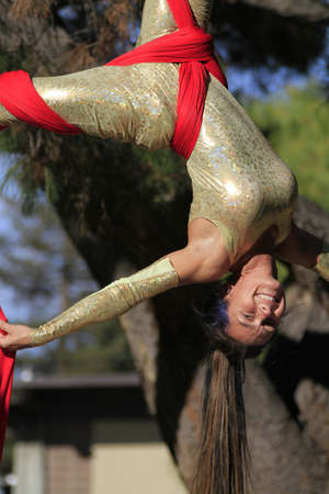 Acrobat in a parkの写真素材