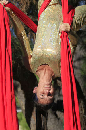 Acrobat in a parkの写真素材