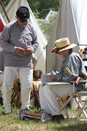 Civil War Reenactment; people talking, chatting, eatingのeditorial素材