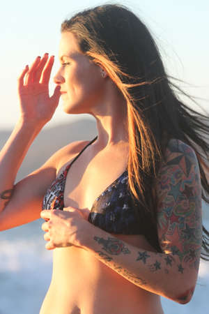 Pretty girl on a beachの写真素材