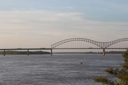 Mississipi river, bridge and boats, outdoor viewの写真素材