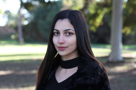 Middle Eastern girl in a park