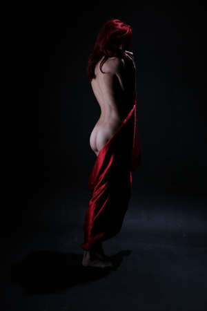 Photoshoot of a redhead in studioの写真素材