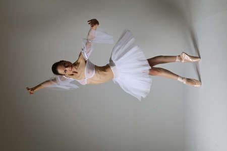 Photoshoot of a ballerina posing in a studioの写真素材