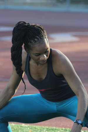 Athlete in Action on a track and fieldの写真素材