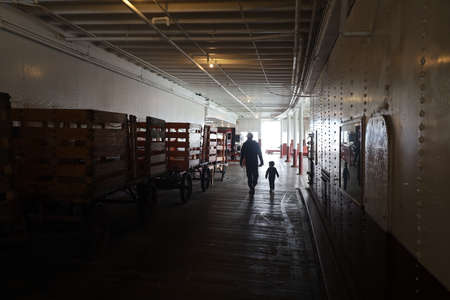 San Francisco, California: 6-22-2021: Maritime Museum of San Francisco California, Classic cars and tractors in cargoのeditorial素材