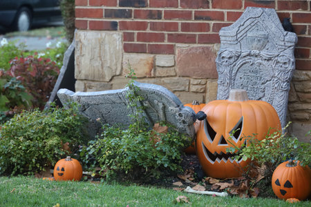 11-1-2022: Burlingame, California: Halloween decorations on streets, Pumpkins in a yardのeditorial素材
