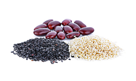 Red bean,White sesame and black sesame seed in bowls isolated on white background.の写真素材