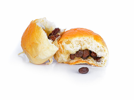 bread with raisins on a white backgroundの写真素材