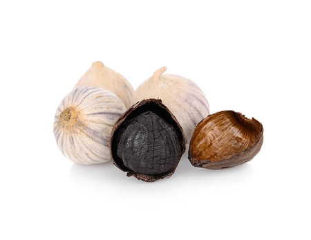 Black Garlic (Allium sativum) isolated on white backgroundの写真素材