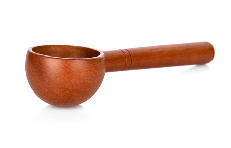 wooden spoon isolated on white backgroundの写真素材