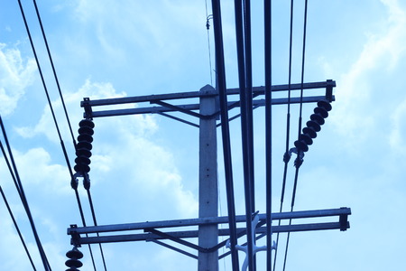 Electric pole with sky as backgroundの写真素材