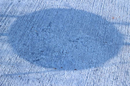 Cement floors are shiny gray circles is the background.の写真素材