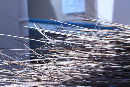 Broom and coconut palms, is a brown background.の写真素材