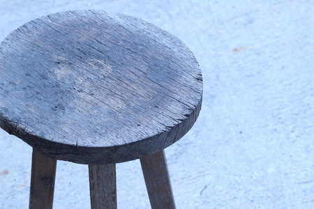 Round wooden chair placed in the outdoor gardenの写真素材