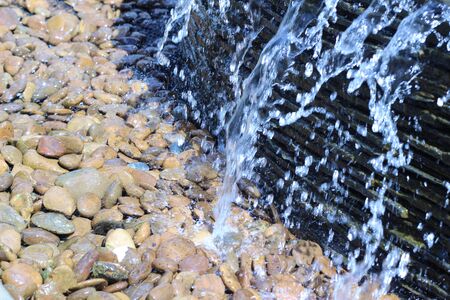 Beautiful ornamental fountain in the outdoor gardenの写真素材
