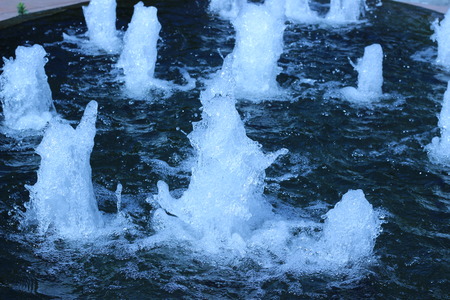 Beautiful ornamental fountain in the outdoor gardenの写真素材