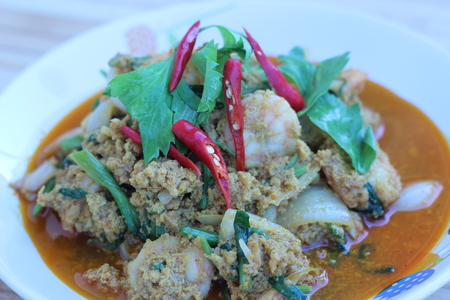 Shrimp touch Shrimp Curry bright eat in white plate (in Thailand)の写真素材