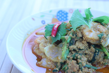 Shrimp touch Shrimp Curry bright eat in white plate (in Thailand)の写真素材