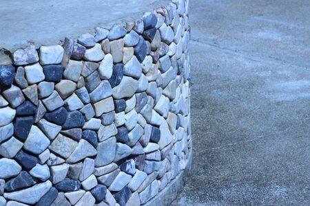 The background is a rock shaped like a triangle and rectangle beautifulの写真素材