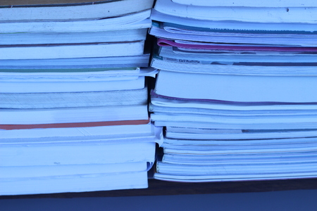 Books are stacked highの写真素材