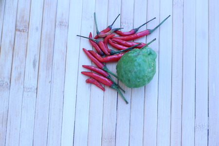 Fresh vegetables placed together on a brown backgroundの写真素材