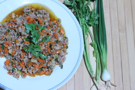 Fried pork chops with carrots, onion, celery and garlic (Thailand Food)の写真素材