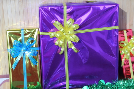 Gift box of multi-colored ribbons arranged beautifullyの写真素材
