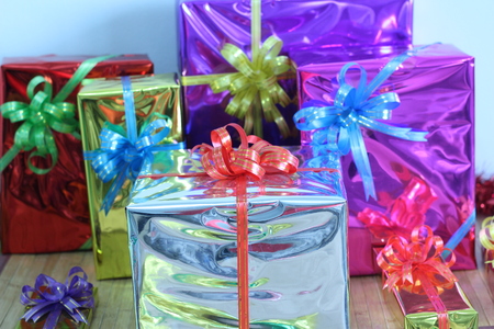 Gift box of multi-colored ribbons arranged beautifullyの写真素材