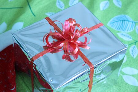 Gift box of multi-colored ribbons arranged beautifullyの写真素材