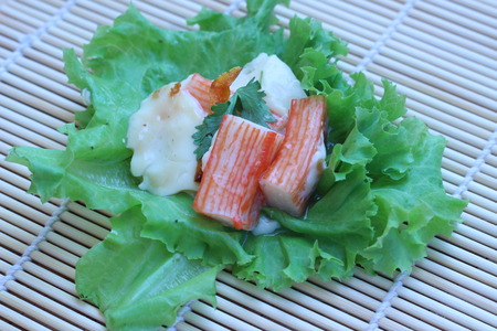 Mix crab meat, poached egg in a cup of delicious foodの写真素材