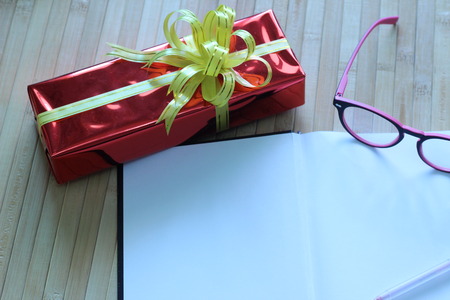 Gift box of multi-colored ribbons arranged beautifullyの写真素材