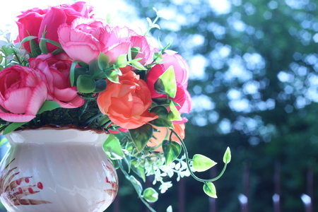Flowers in a vase multiplicity paint outdoors in the gardenの写真素材