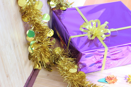 Gift box of multi-colored ribbons arranged beautifullyの写真素材