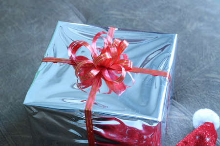 Gift box of multi-colored ribbons arranged beautifullyの写真素材