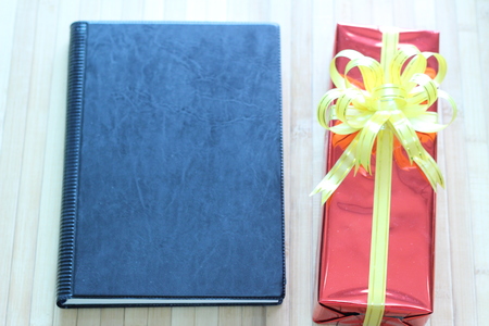 Gift box of multi-colored ribbons arranged beautifullyの写真素材