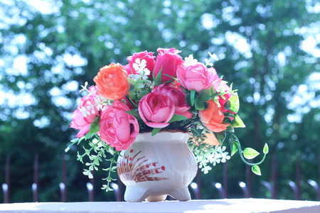 Flowers in a vase multiplicity paint outdoors in the gardenの写真素材